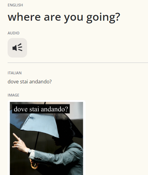 screenshot which includes a picture of a person with an umbrella pointing